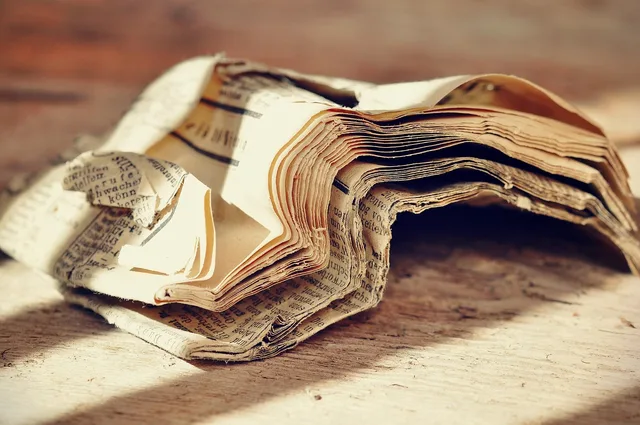 newspaper, daily newspaper, day sheet, pages, wrinkled, old, antique, writing, old script. New York LLC publication rules, which counties still require newspaper notices
